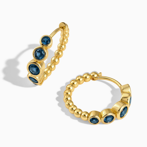 18KT Yellow Gold Vermeil Round London Blue Topaz Bezel Hoop Earrings - Beaded Reverie Front View