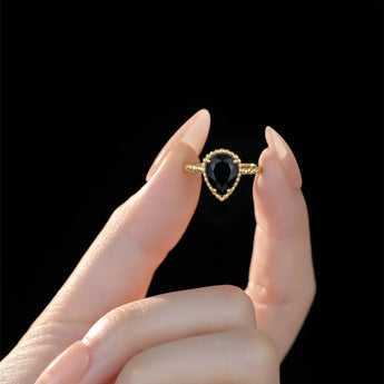 18KT Yellow Gold Vermeil Black Onyx Pear Ring - Still Light Hand-Held Shot