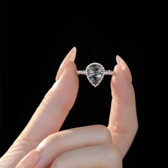 925 Sterling Silver Black Rutilated Quartz Pear Ring - Still Light Hand-Held Shot