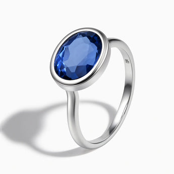 925 Sterling Silver Oval Blue Sapphire Bezel Ring - Contour Side View