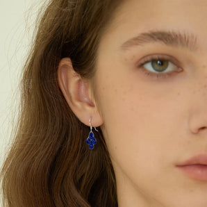 925 Sterling Silver Pear Blue Sapphire Dangle Earrings - Petal Rain Model Shot