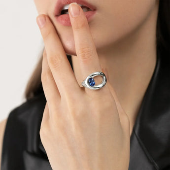Oval Blue Sapphire Embrace Ring - Enfolding Arch 925 Sterling Model Shot