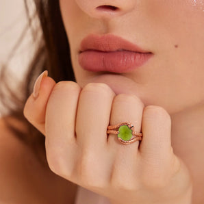 Oval Peridot Coil Ring - Serpent's Embrace 18KT Rose Gold Vermeil Model Shot